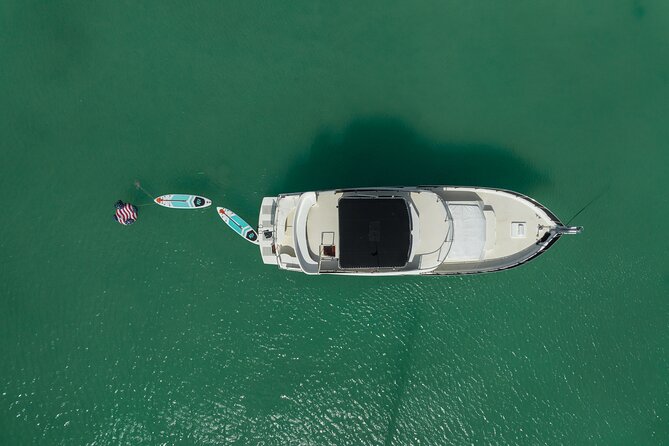 4 Hours - 53' Hatteras - Tulum, Playa Del Carmen, Riviera Maya - Meeting Point Reality: Puerto Aventuras Area and Check-In Timing