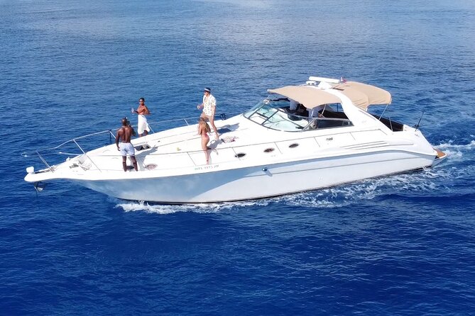 4 hours - Private 48ft Yacht all inclusive in Tulum and Playa del Carmen - Stop 2: INAH reef snorkeling (about 1 hour)