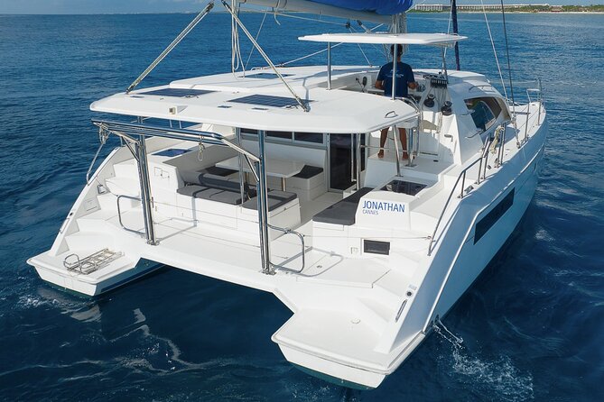 8-Hour Private 40' Cat 2 Stop to Cozumel, Food, Drinks & Snorkel - Sunset Return Through the Riviera Maya Jungle Region
