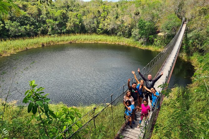 Adventure in a Private Mayan Community - The hanging bridge and rappel: your cenote adventure gets real
