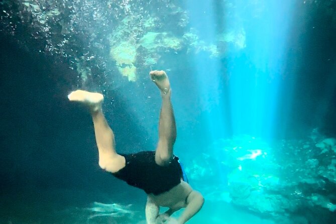 E-bike cenote jungle city tour in Playa del Carmen - The hidden cenote stop: snorkeling, dock jumps, and built-in photo time