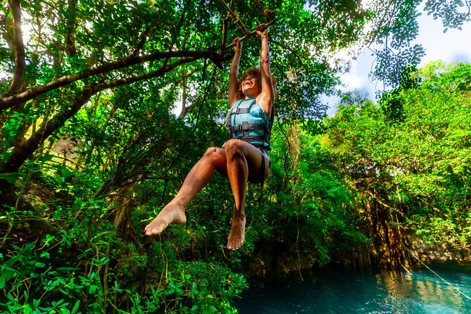 From Playa del Carmen ATV Adventure with Ziplines, Cenote - Cenote swim and jump platform: the moment most people remember
