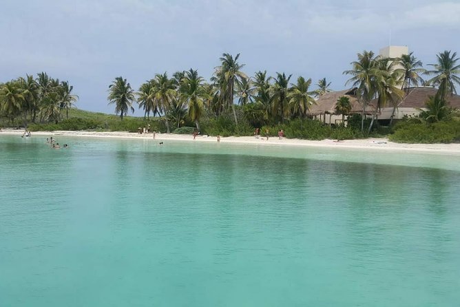 Isla Mujeres Unlimited! Fun & Party with transportation - The catamaran cruise: family party energy, not a quiet day