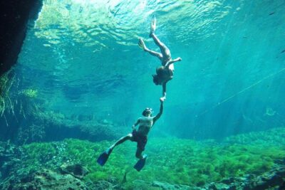 Ride to a life changing cenotes tour - Three cenotes in one outing: cave, sunlit swim, and a jump moment